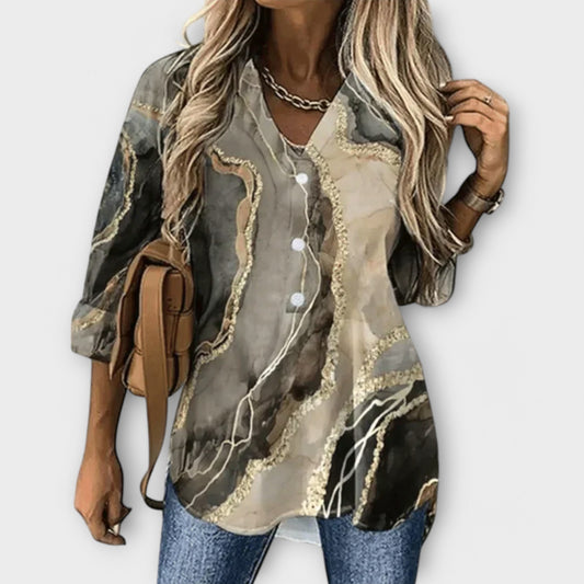Filine – Elegantie en Uniekheid in een Damesblouse